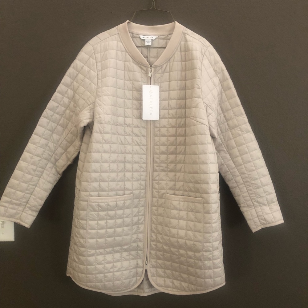 Cream color jacket by Athletica